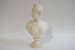 After the Antique, a 19th century marble bust of a lady on a socle base,