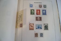 A collection of Belgium stamps in two Davo albums, including 1849-50 10c.