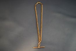 A 9 carat rose gold albert watch chain, with two swivels and a T bar, 39 cm long,