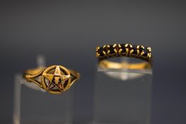 A 9 carat gold masonic ring, the star shape motif enamelled with various symbols,