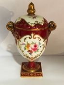 A 20th century Wedgwood porcelain pedestal vase and cover,