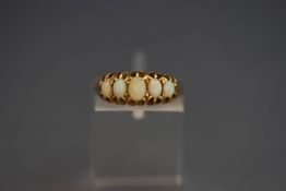 A late Victorian five stone opal 18 carat gold ring, London 1897, finger size m1/2, 3.