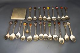 A collection of silver and plated tourist spoons;