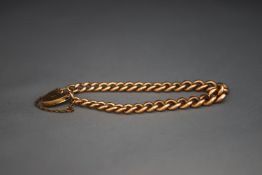 A 9 carat rose gold bracelet, of solid curb links, to a padlock clasp, 25.