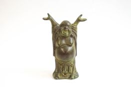 A painted bronze figure of a laughing Buddha with outstretched arms, 18.