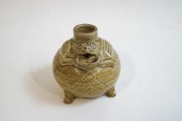 A Chinese celadon earthenware water dropper of globular form,