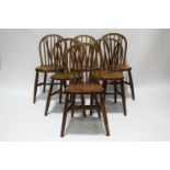 A set of six Windsor elm stickback chairs,