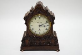 A 19th century walnut mantel clock by Henry Lamb, London, with thirty hour fusee movement, pendulum,