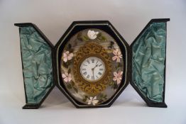 An early 20th century agate strut clock,