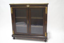 A Victorian ebonised pier cabinet with boxwood inlay,