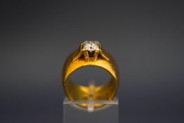 A single stone diamond 22 carat gold ring, the brilliant cut of approximately 0.