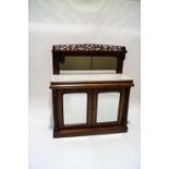 A Victorian mahogany mirror back chiffonier, with marble top above mirrored cupboard doors,