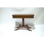 A rosewood card table with William IV crossbanded top on later mahogany base with four splayed legs,