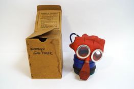 A WWII child's 'Mickey Mouse' gas mask,