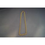 A chain, stamped '750', of round belcher links, 44 cm long,