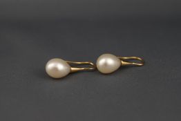 A pair of cultured pearl drop earrings with yellow shepherd's crook fittings, stamped '18k', approx.