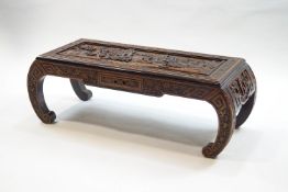 A Chinese low table with scroll ends,