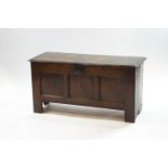 A 17th century and later oak coffer, with triple panelled front,