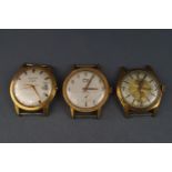 Three various vintage gold-plated and stainless steel wrist watch heads, circa 1940-1960,