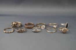 Ten various silver or white metal rings including a cubic zirconia solitaire ring,