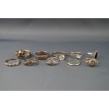 Ten various silver or white metal rings including a cubic zirconia solitaire ring,