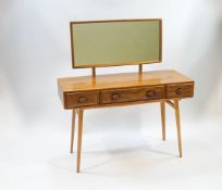 An Ercol elm and beech dressing table with mirror and three drawers,