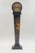 A Grandmother clock with blue and gilt chinoiserie decoration of a figure on a bridge before a