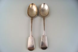 A pair of Victorian silver fiddle pattern table or serving spoons, each with a script monogram 'ED',