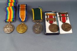 Two WWI medals, Victory and George V, named to 30852 PTE P F Warner, E Surrey Reg,