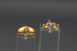 Two early 20th century gold and diamond rings,