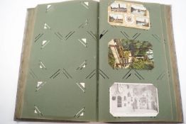 A collection of Victorian and Edwardian postcards within an album, including Isle of Wight, London,