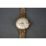 Limit, a lady's 9ct gold round bracelet watch, circa 1965,