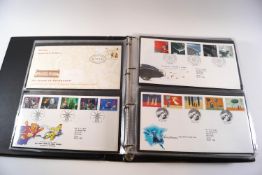Twelve albums of First Day Covers,