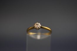 An early 20th century diamond solitaire ring, the round brilliant approx. 0.
