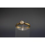 An early 20th century diamond solitaire ring, the round brilliant approx. 0.