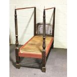 A Victorian child's mahogany four poster bed, with some replacement supports, takes a 2' 6"mattress,