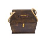 A cartridge ammunition wooden box with rope handles,