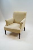 A 19th century armchair with turned mahogany legs