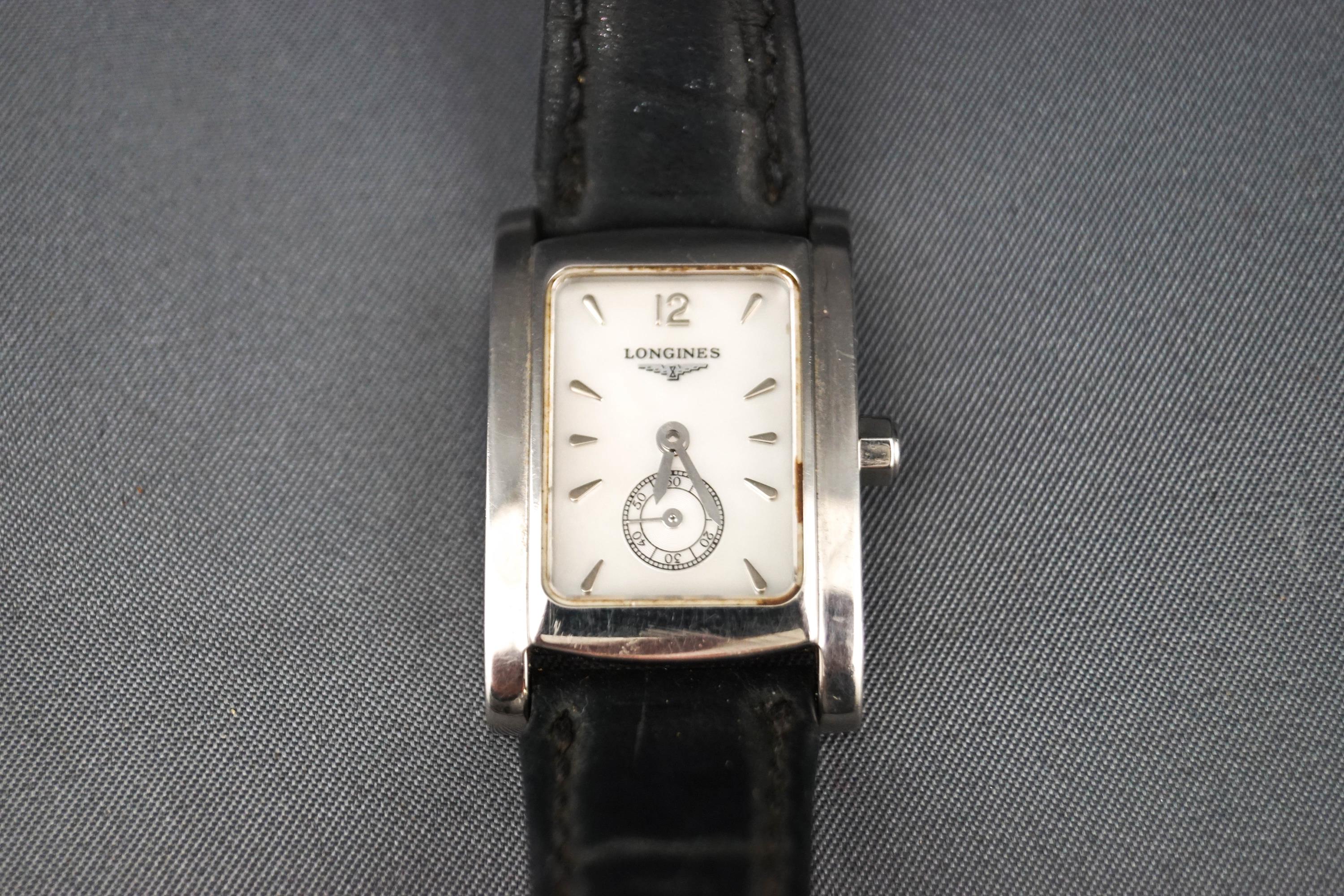 Longines, a lady's stainless steel rectangular wrist watch,