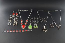 A miscellaneous collection of white metal and gem set jewellery,
