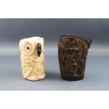 A native carved bone figure of an owl,