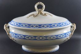 A Wedgwood earthenware tureen and cover with blue transfer printed decoration and gilt 'ribbons',