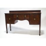 A Warings & Gillows mahogany bow fronted sideboard,