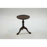 An 19th century mahogany miniature tripod table,