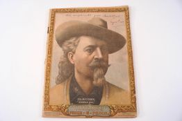 A 'Buffalo Bill' Wild West programme, with inscription, dated 1903, together with a hardback book,