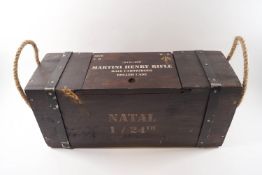 A Martini Henry rifle case, metal banded with rope handles,