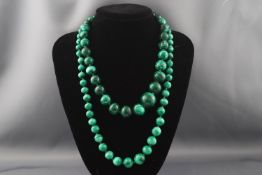 Two malachite bead necklaces, one the beads graduated approx. 20.0mm - 9.