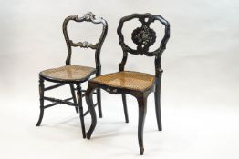 Two Victorian ebonised and mother of pearl inlaid chairs with cane seats