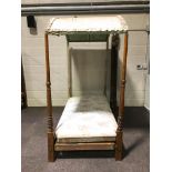 A Victorian mahogany campaign bed with fabric covered canopy and two end posts, takes a 3' mattress,