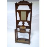 A late Victorian oak hallstand with carved detail including a Green Man,